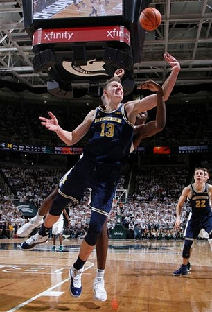 Moritz Wagner (13) and Duncan Robinson (22)