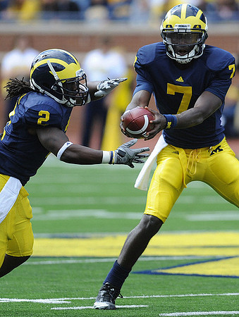 Vincent Smith (2) and Devin Gardner (7)
