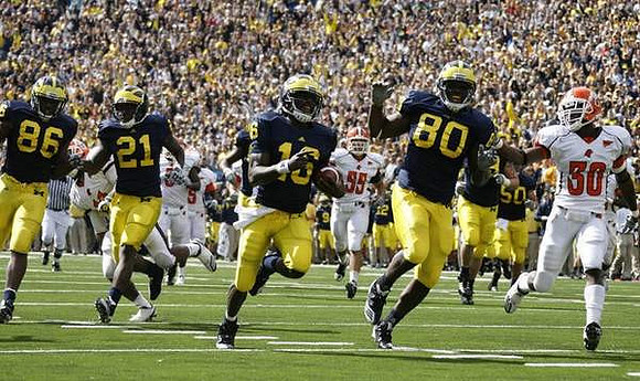 Kevin Koger (86), Junior Hemingway (21), Denard Robinson (16), and Martell Webb (80)