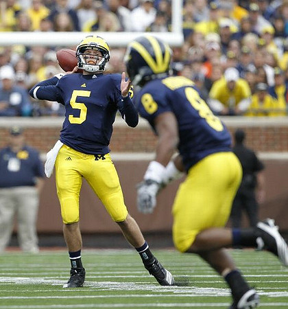 Tate Forcier (5) and Terrence Robinson (8)