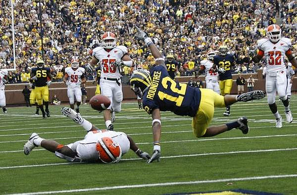 Roy Roundtree (12) and Patrick Omameh (65)