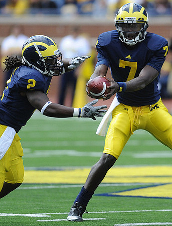 Vincent Smith (2) and Devin Gardner (7)