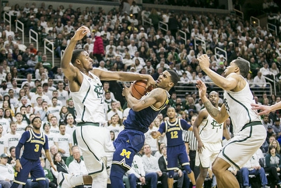 Zavier Simpson (3), Charles Matthews (1), and Muhammad-Ali Abdur-Rahkman (12)