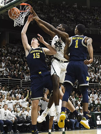 Jon Teske (15) and Charles Matthews (1)