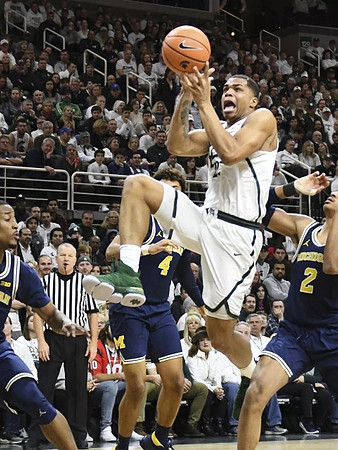 Muhammad-Ali Abdur-Rahkman (12), Isaiah Livers (4), and Jordan Poole (2)