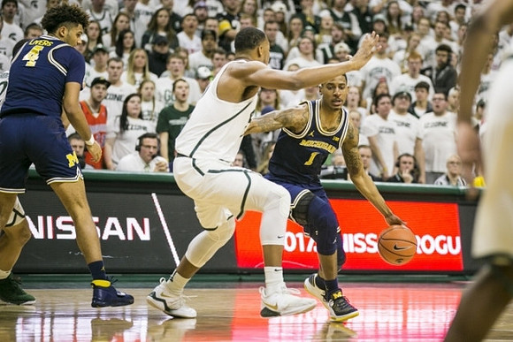 Isaiah Livers (4) and Charles Matthews (1)