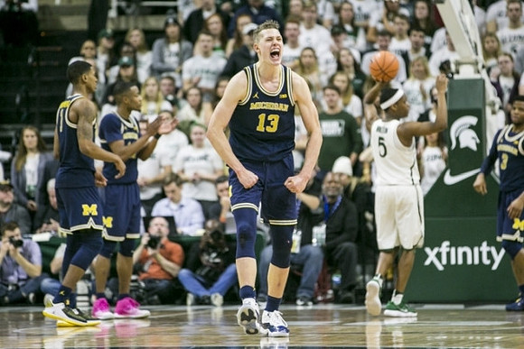 Charles Matthews (1), Muhammad-Ali Abdur-Rahkman (12), Moritz Wagner (13), and Zavier Simpson (3)