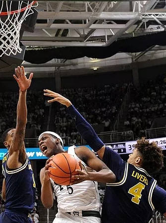 Charles Matthews (1) and Isaiah Livers (4)