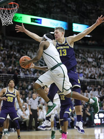 Eli Brooks (55), Muhammad-Ali Abdur-Rahkman (12), and Moritz Wagner (13)