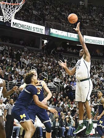 Isaiah Livers (4) and Moritz Wagner (13)