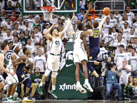 Duncan Robinson (22) and Charles Matthews (1)