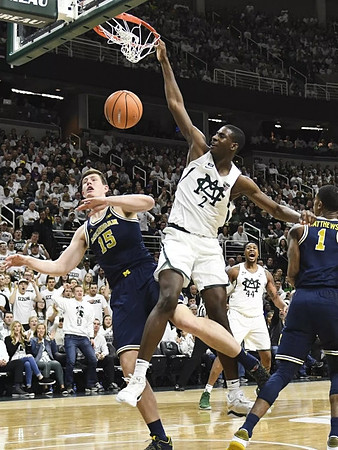 Jon Teske (15) and Charles Matthews (1)