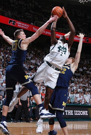 Moritz Wagner (13) and Duncan Robinson (22)