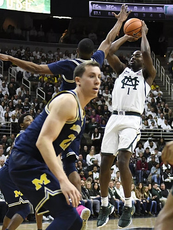 Duncan Robinson (22) and Charles Matthews (1)