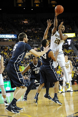 Zak Irvin (21) and Duncan Robinson (22)