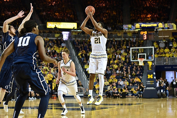 Mark Donnal (34) and Zak Irvin (21)