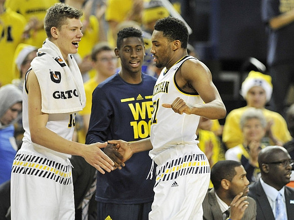 Moritz Wagner (13), Caris LeVert (23), and Zak Irvin (21)