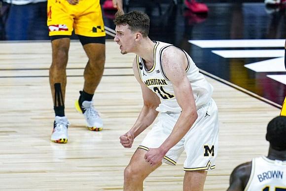 Franz Wagner (21) and Chaundee Brown Jr. (15)