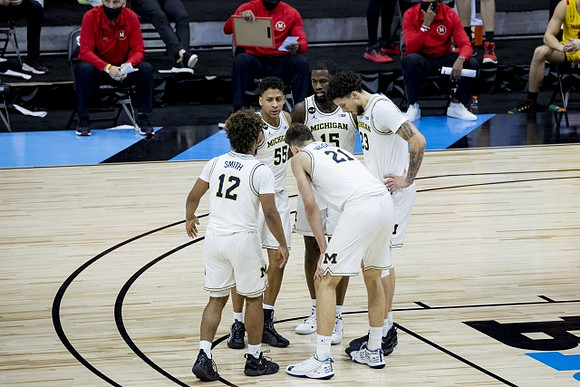 Mike Smith (12), Eli Brooks (55), Chaundee Brown Jr. (15), Brandon Johns Jr. (23), and Franz Wagner (21)