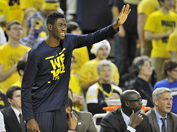 Caris LeVert (23), Bacari Alexander, and Jeff Meyer