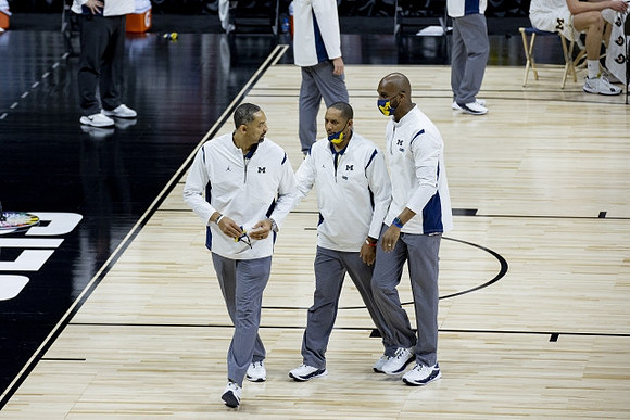 Juwan Howard, Howard Eisley, and Chris Hunter