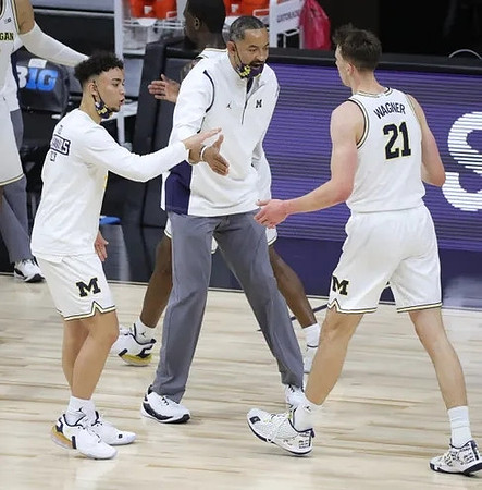 Brandon Wade (4), Juwan Howard, and Franz Wagner (21)