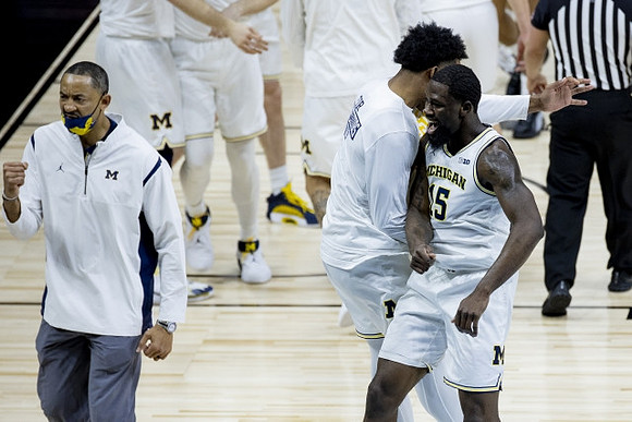 Juwan Howard, Chaundee Brown Jr. (15), and Jace Howard (25)