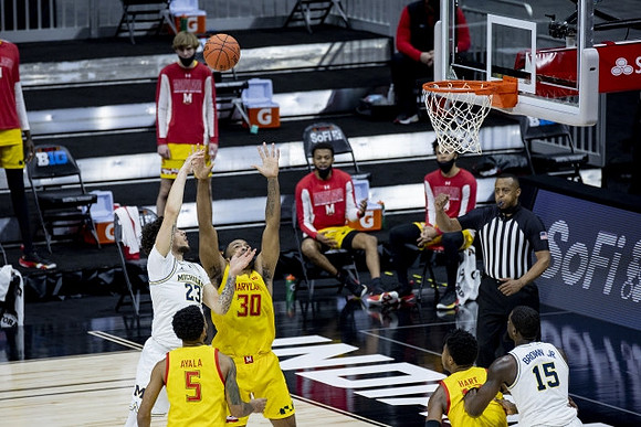 Brandon Johns Jr. (23) and Chaundee Brown Jr. (15)