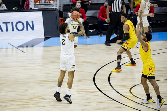 Isaiah Livers (2), Mike Smith (12), and Franz Wagner (21)