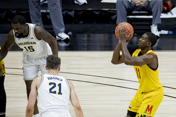 Franz Wagner (21) and Chaundee Brown Jr. (15)
