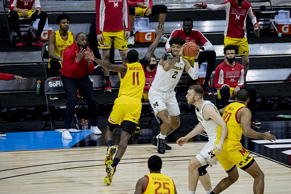 Isaiah Livers (2) and Austin Davis (51)