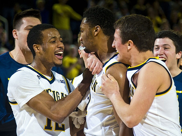 Muhammad-Ali Abdur-Rahkman (12), Zak Irvin (21), Andrew Dakich (11), and Sean Lonergan (20)