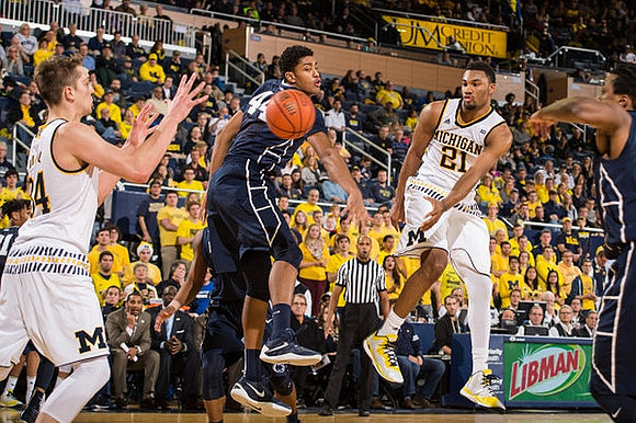 Mark Donnal (34) and Zak Irvin (21)