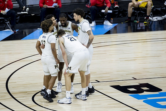 Mike Smith (12), Eli Brooks (55), Chaundee Brown Jr. (15), Brandon Johns Jr. (23), and Franz Wagner (21)