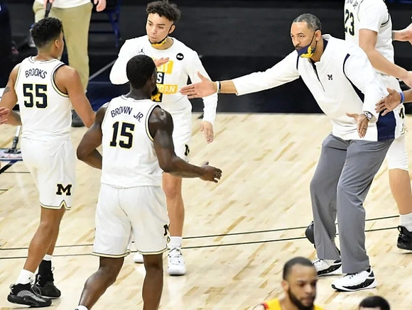 Eli Brooks (55), Chaundee Brown Jr. (15), Brandon Wade (4), Juwan Howard, and Brandon Johns Jr. (23)