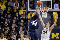 Muhammad-Ali Abdur-Rahkman (12), Duncan Robinson (22), and Mark Donnal (34)