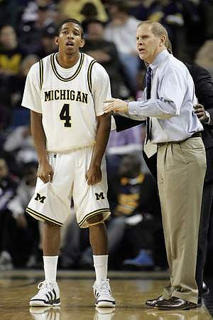 Darius Morris (4) and John Beilein
