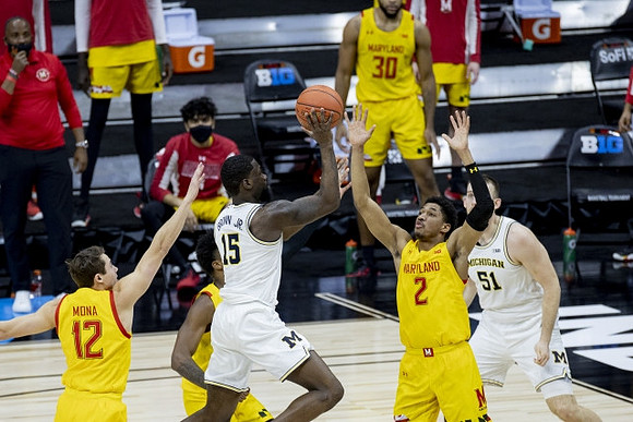 Chaundee Brown Jr. (15) and Austin Davis (51)