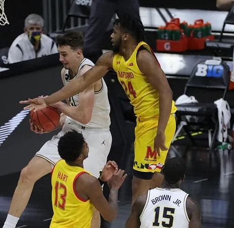 Franz Wagner (21) and Chaundee Brown Jr. (15)