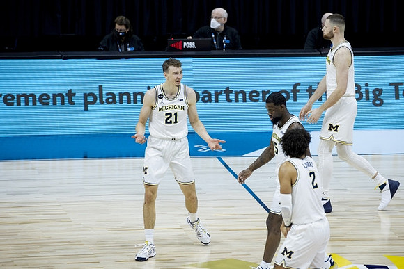 Franz Wagner (21), Isaiah Livers (2), Chaundee Brown Jr. (15), and Hunter Dickinson (1)