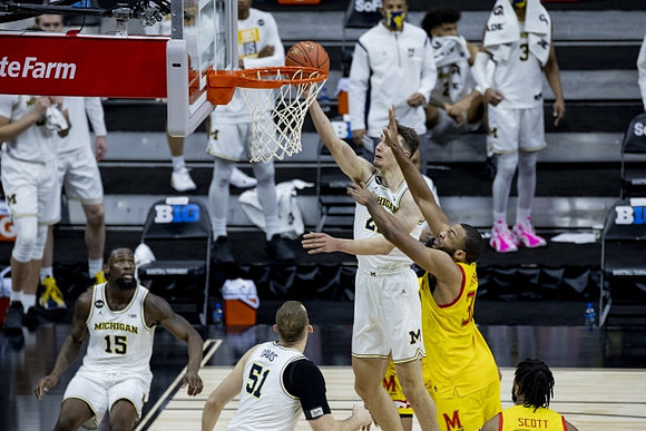 Chaundee Brown Jr. (15), Austin Davis (51), and Franz Wagner (21)