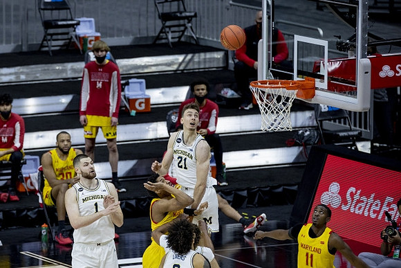 Hunter Dickinson (1), Franz Wagner (21), and Isaiah Livers (2)