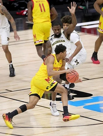 Chaundee Brown Jr. (15) and Mike Smith (12)