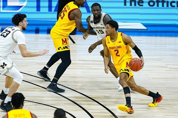 Brandon Johns Jr. (23) and Chaundee Brown Jr. (15)
