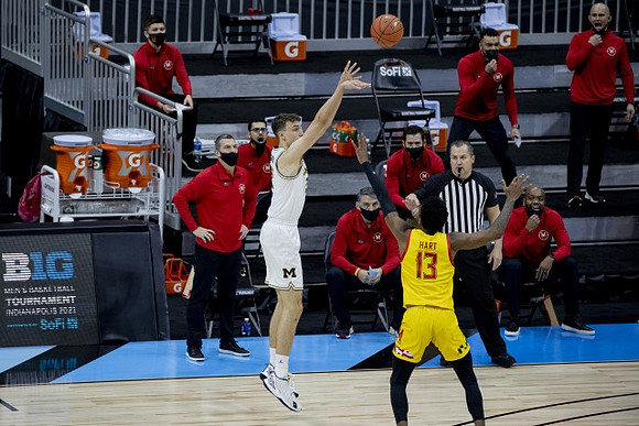 Franz Wagner (21) and Maryland Head Coach Mark Turgeon