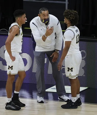 Eli Brooks (55), Juwan Howard, and Mike Smith (12)