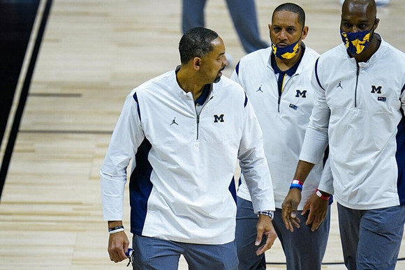 Juwan Howard, Howard Eisley, and Chris Hunter
