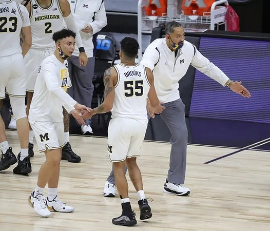 Brandon Wade (4), Eli Brooks (55), Juwan Howard, Brandon Johns Jr. (23), and Isaiah Livers (2)