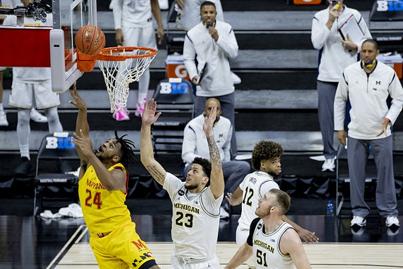 Brandon Johns Jr. (23), Mike Smith (12), and Austin Davis (51)