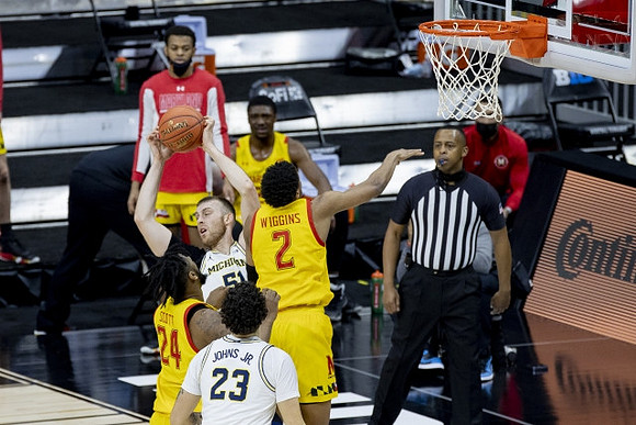 Austin Davis (51) and Brandon Johns Jr. (23)